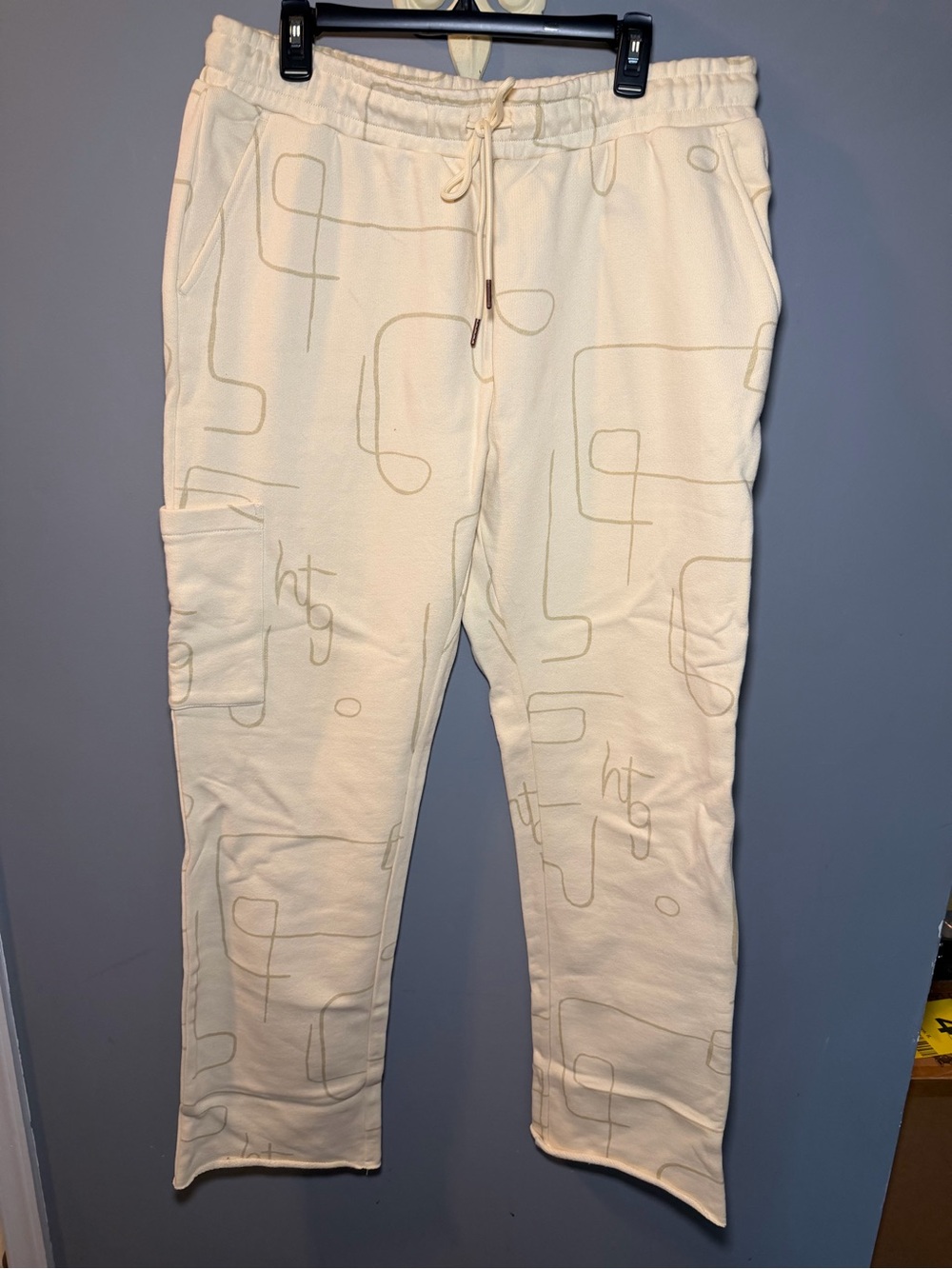 Men's Cream Graphic Jogger Pants with Subtle Line Print